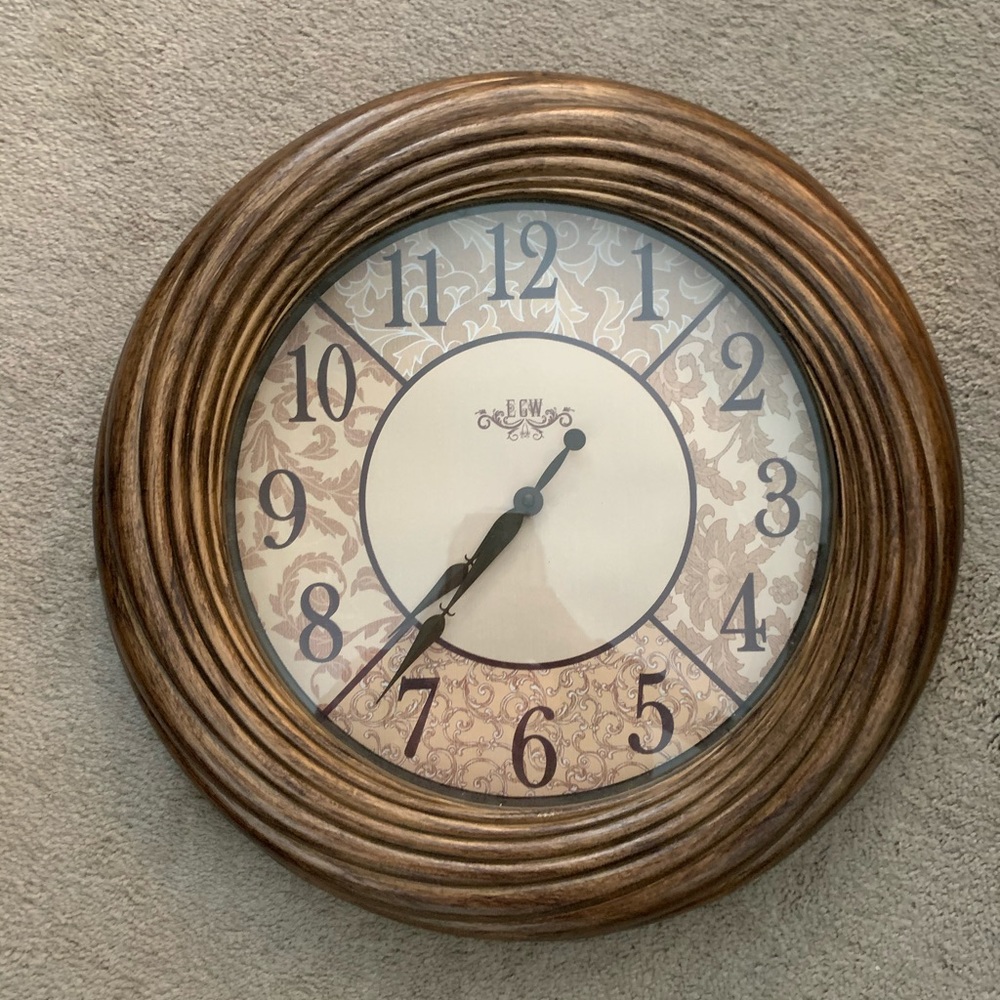 Kirkland’s plastic bronzy swirl like border brown gold big clock